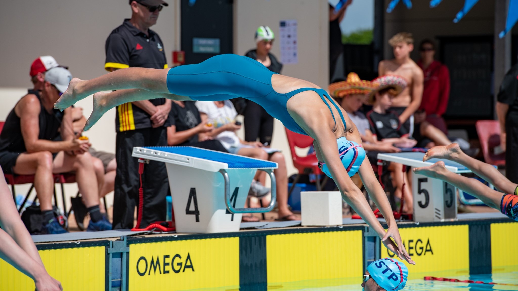 Swimming Club racing at a senior level