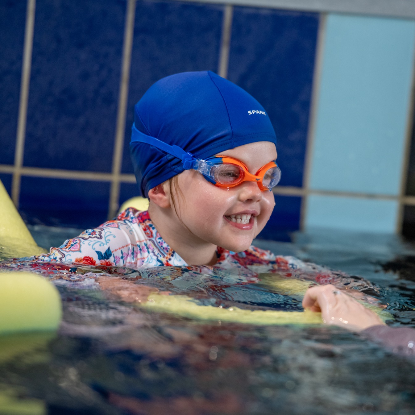 Girl learning to swim
